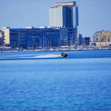 Bilocale Con Giardino Baia By Nonsolomare Vacanze Srlu Apartment