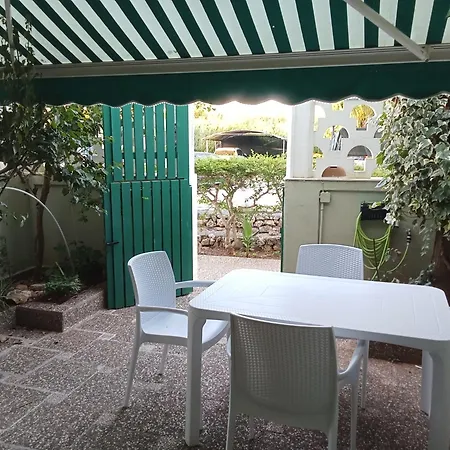 Bilocale Con Giardino Baia By Nonsolomare Vacanze Srlu アパート