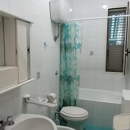 Bilocale Con Giardino Baia By Nonsolomare Vacanze Srlu Апартаменты