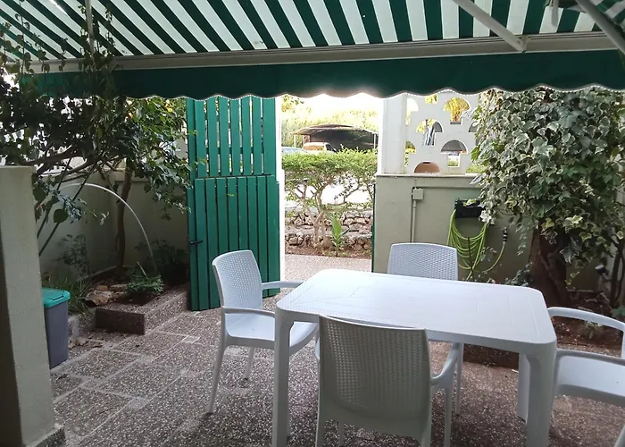 Bilocale Con Giardino Baia By Nonsolomare Vacanze Srlu شقة